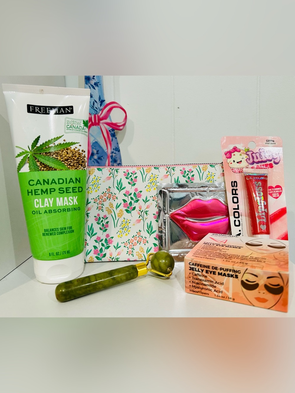 ipsy Floral Cosmetic Bag with Pink Lip Mask and Green Roller